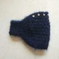Strickstirnband für Damen mit Blumenakzenten