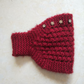 Strickstirnband für Damen mit Blumenakzenten